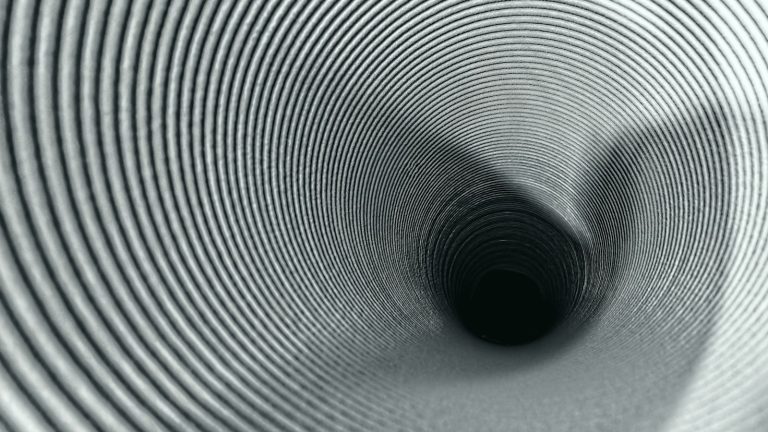 Black and white funnel-shaped tunnel narrowing toward a single opening, like the stages of a sales funnel